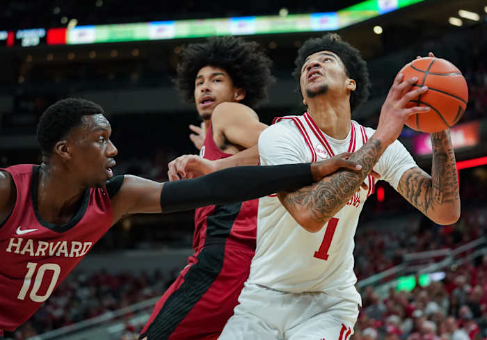 Indiana Hoosiers center Kel'el Ware (1) is fouled by Harvard Crimson forward Chisom Okpara (10) during the game against Harvard in Gainbridge Fieldhouse.
